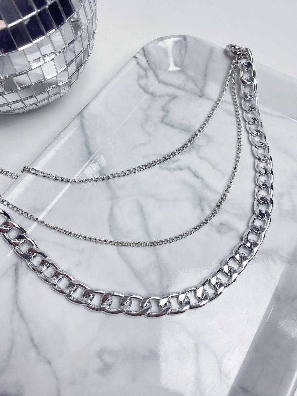 Charm de Correntes Triplas