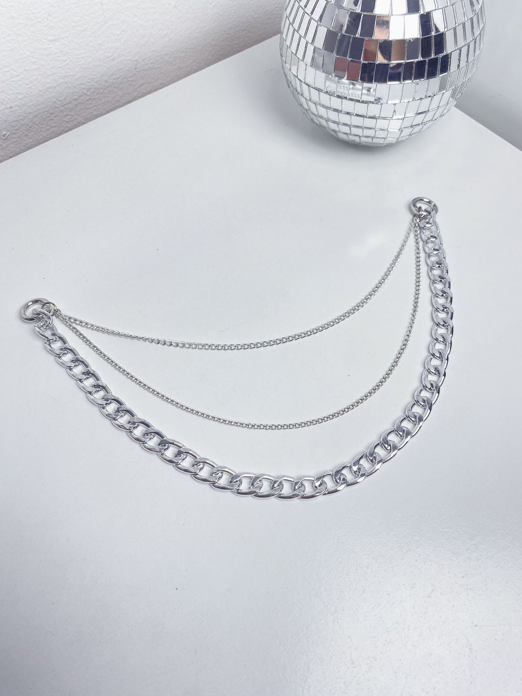 Charm de Correntes Triplas